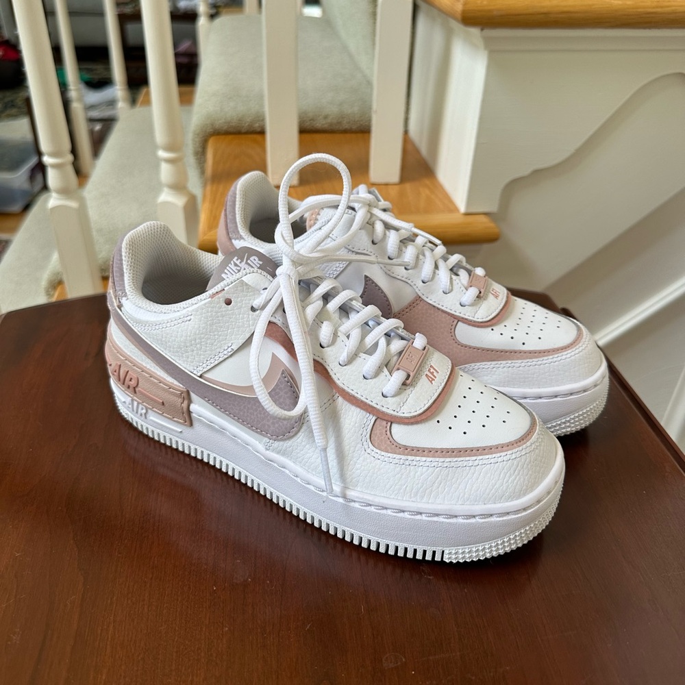 Nike “White Pink Oxford” air force shadows in a size 7.